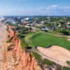 Aerial. View from the sky at the golf courses in the tourist town Vale de Lobo. Vilamoura.