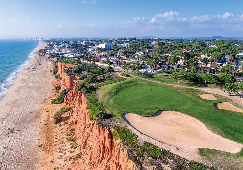 Aerial. View from the sky at the golf courses in the tourist town Vale de Lobo. Vilamoura.